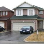 garage door with car in front