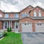 House front with two garage