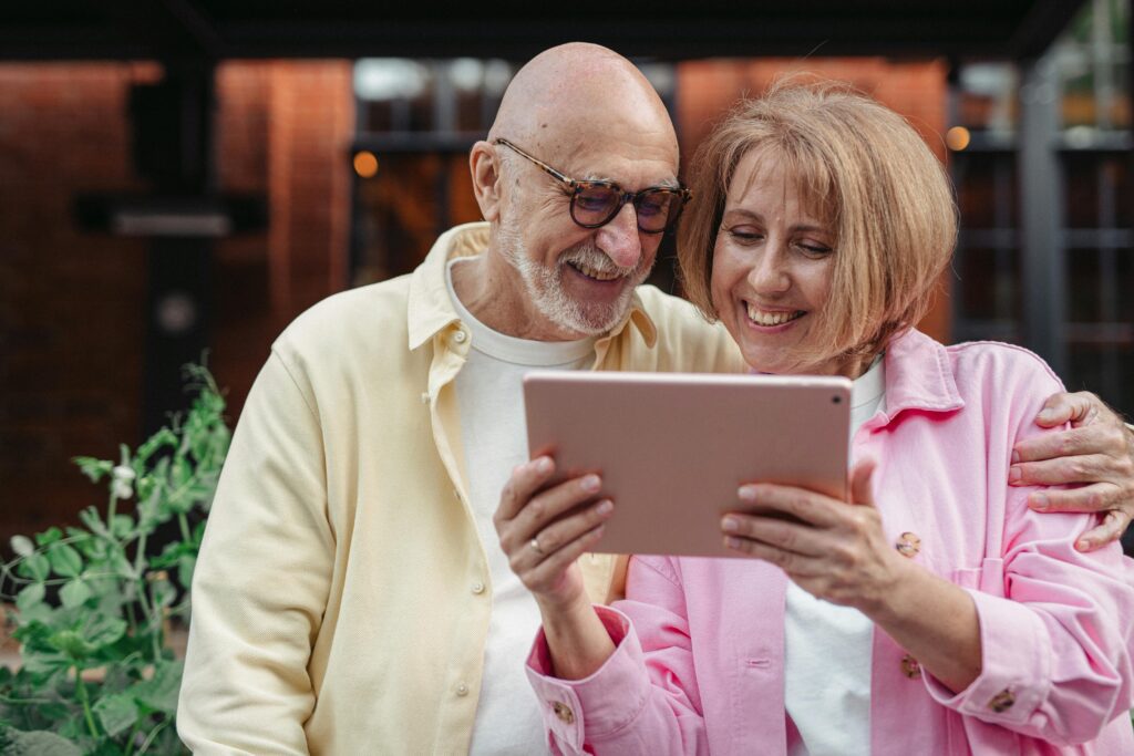 A couple discussing their decision to rent or buy a home, considering downsizing options.