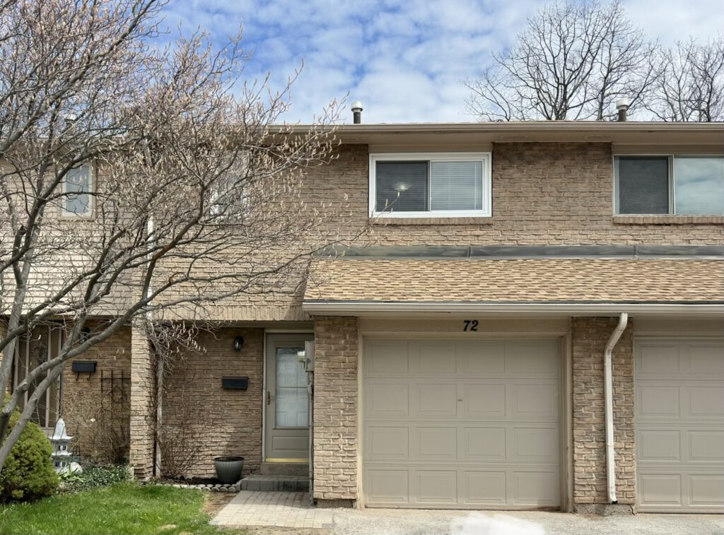 Exterior of 1556 Lancaster Drive Unit 72, renovated townhouse for sale in Upper Oakville